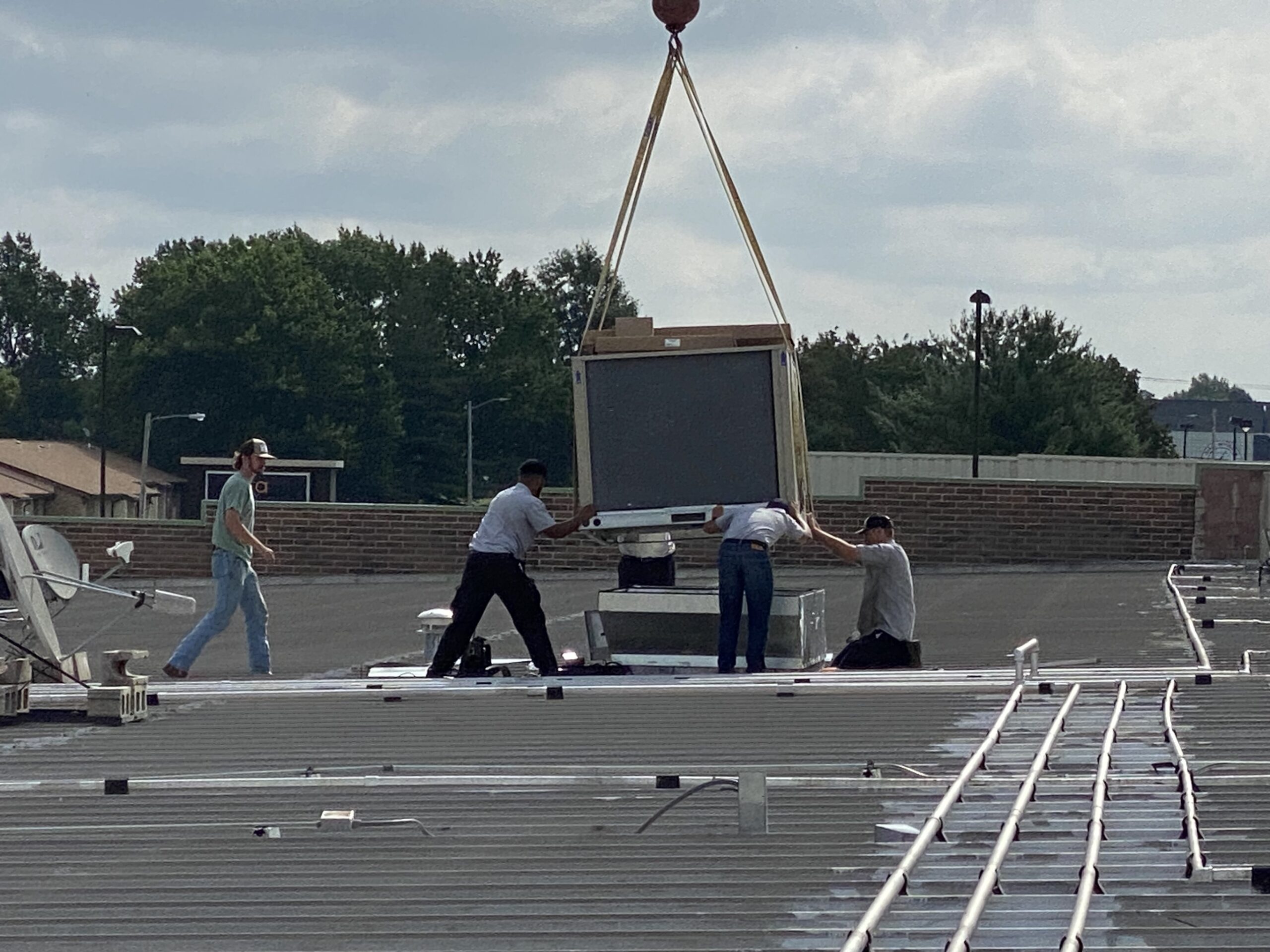 Our team working hard on a commercial project in Springfield, MO.